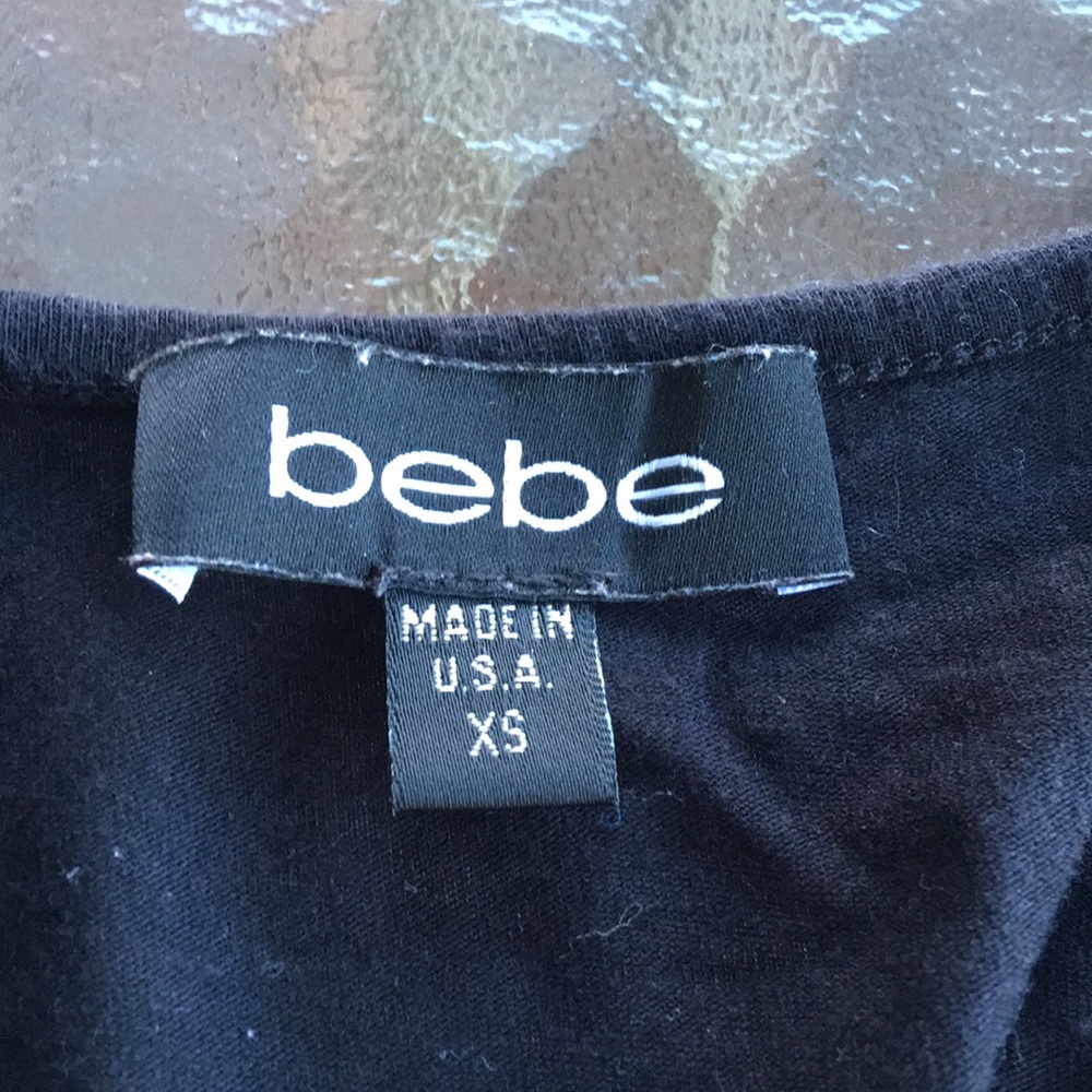 BEBE tank top cropped in the back